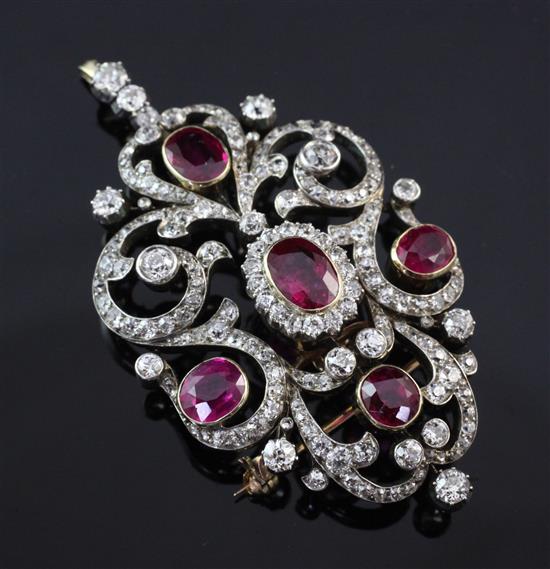 An attractive early 20th century gold and platinum, ruby and diamond pendant brooch, overall 2.5in.